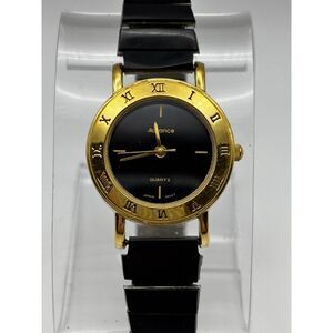 Advance vintage black and gold stretch band women's watch, working